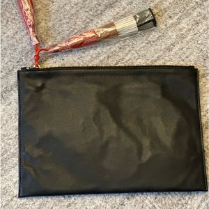 Nora lozza hand bag.  Tassel clutch